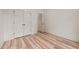 Bedroom with hardwood floors and closet at 250 Ellington Rd, Graham, NC 27253