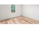 Bedroom featuring a window that offers views of the outdoors at 250 Ellington Rd, Graham, NC 27253