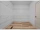 Walk-in closet with wood-look flooring and wire shelving at 250 Ellington Rd, Graham, NC 27253