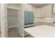 A modern kitchen boasting shaker cabinets, stainless appliances, a spacious island and an adjacent pantry at 250 Ellington Rd, Graham, NC 27253