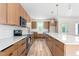Updated kitchen with stainless steel appliances, shaker cabinets, island and hardwood floors at 250 Ellington Rd, Graham, NC 27253