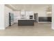 Modern kitchen with a center island, stainless steel appliances, and stylish pendant lighting at 250 Ellington Rd, Graham, NC 27253
