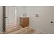 Laundry room featuring a sink, cabinet and hookups at 250 Ellington Rd, Graham, NC 27253