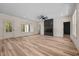 Bright, open living room with fireplace and modern ceiling fan at 250 Ellington Rd, Graham, NC 27253