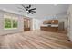 Open-concept living space with kitchen island and modern pendant lighting at 250 Ellington Rd, Graham, NC 27253