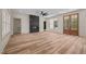 Spacious living room showcasing fireplace, modern light fixture, and flooring at 250 Ellington Rd, Graham, NC 27253