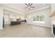 Open concept living room and kitchen with bright luxury vinyl plank flooring at 250 Ellington Rd, Graham, NC 27253