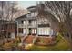 Two-story home with brick facade, balcony, and landscaping at 2800 Peachleaf St, Raleigh, NC 27614