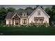 Craftsman style home with a welcoming front porch and stone accents at 2801 Mount View Church Rd, Moncure, NC 27559