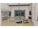 Bright living room featuring an open concept design, fireplace, modern chandelier, and comfortable seating at 2801 Mount View Church Rd, Moncure, NC 27559
