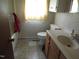 Bathroom featuring a vanity with storage, a toilet, and a shower/tub combination at 306 Eastway Ln, Graham, NC 27253