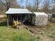 Backyard shed needing repair or replacement at 306 Eastway Ln, Graham, NC 27253