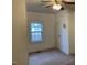 Bright bedroom with window, closet, and ceiling fan at 3077 Christian Light Road Rd, Fuquay Varina, NC 27526