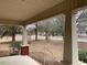 Front porch with view of a tree-lined street at 3077 Christian Light Road Rd, Fuquay Varina, NC 27526