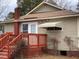 Tan house with red brick steps and awning at 3077 Christian Light Road Rd, Fuquay Varina, NC 27526