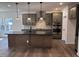 Open kitchen featuring a center island, modern cabinetry, and stainless appliances at 3271 Roundly Rd # 9, New Hill, NC 27562