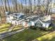 White two-story house with a large yard and walkway at 3872 Hope Valley Rd, Durham, NC 27707