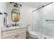 Modern bathroom with walk-in shower and marble vanity at 3872 Hope Valley Rd, Durham, NC 27707