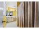 Bright bathroom with shower, vanity, and tiled floor at 3872 Hope Valley Rd, Durham, NC 27707