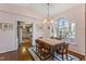 Charming breakfast room with a table and large windows overlooking a deck at 3872 Hope Valley Rd, Durham, NC 27707