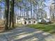 Two-story white house with a long driveway at 3872 Hope Valley Rd, Durham, NC 27707
