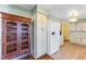 Kitchen with white cabinets, tile backsplash and wine storage at 3872 Hope Valley Rd, Durham, NC 27707