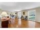 Spacious living room with hardwood floors and large windows at 3872 Hope Valley Rd, Durham, NC 27707
