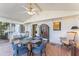 Bright sunroom with tiled floor, table and chairs, offering a relaxing space at 3872 Hope Valley Rd, Durham, NC 27707