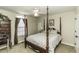 Bedroom with a four poster bed, ceiling fan, and dresser at 3977 Baybrook Rd, Nashville, NC 27856