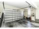 Attached garage with concrete floor and overhead door at 3977 Baybrook Rd, Nashville, NC 27856