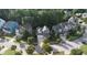 Aerial view of a neighborhood with houses and trees at 401 Streamwood Dr, Holly Springs, NC 27540