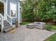 Relaxing patio with seating area, perfect for outdoor entertaining at 401 Streamwood Dr, Holly Springs, NC 27540