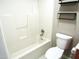 Bathroom with shower/tub combo and wood vanity at 409 James Toney Dr, Elon, NC 27244