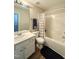 Clean bathroom with white vanity, tub, and shower at 4232 Vienna Crest Dr, Raleigh, NC 27613
