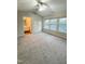 Spacious bedroom with ceiling fan, large windows and en-suite bathroom at 4232 Vienna Crest Dr, Raleigh, NC 27613
