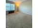 Spacious bedroom with carpeted floor, large window, and a media console at 4232 Vienna Crest Dr, Raleigh, NC 27613