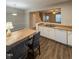 Kitchen with light wood cabinets, double sink and island at 4232 Vienna Crest Dr, Raleigh, NC 27613