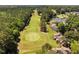 Beautiful aerial view of golf course homes offering stunning views and community features at 5101 Hogans Way, Clayton, NC 27520