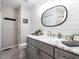 Stylish bathroom featuring shiplap walls, a modern vanity with a sleek mirror, and contemporary fixtures at 5101 Hogans Way, Clayton, NC 27520