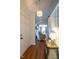 Bright entryway with hardwood floors and view into living area at 5101 Hogans Way, Clayton, NC 27520