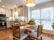 Bright eat-in kitchen with stainless steel appliances and granite countertops at 5101 Hogans Way, Clayton, NC 27520