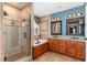 Large bathroom with double vanity, soaking tub, and walk-in shower at 6132 Wolverhampton Dr, Raleigh, NC 27603