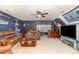 Spacious game room with leather couches and bar at 6132 Wolverhampton Dr, Raleigh, NC 27603