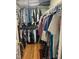 Large walk-in closet with ample hanging and shelf space at 701 Brickstone Dr, Apex, NC 27502