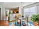 Cozy dining area with hardwood floors and access to the kitchen at 701 Brickstone Dr, Apex, NC 27502