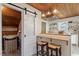 Kitchen with breakfast bar and farmhouse sink at 7120 Sandringham Dr, Raleigh, NC 27613