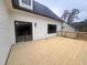 Back deck with a sliding glass door for easy indoor-outdoor flow at 727 Cook Rd, Durham, NC 27713