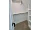 Walk-in closet with shelving and hanging rods for efficient storage at 727 Cook Rd, Durham, NC 27713