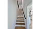 Staircase leading to a bright, open living space at 727 Cook Rd, Durham, NC 27713