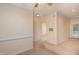 Empty living room with beige carpet, neutral paint, and traditional style baseboard at 1300 Durlain Dr # 108, Raleigh, NC 27614